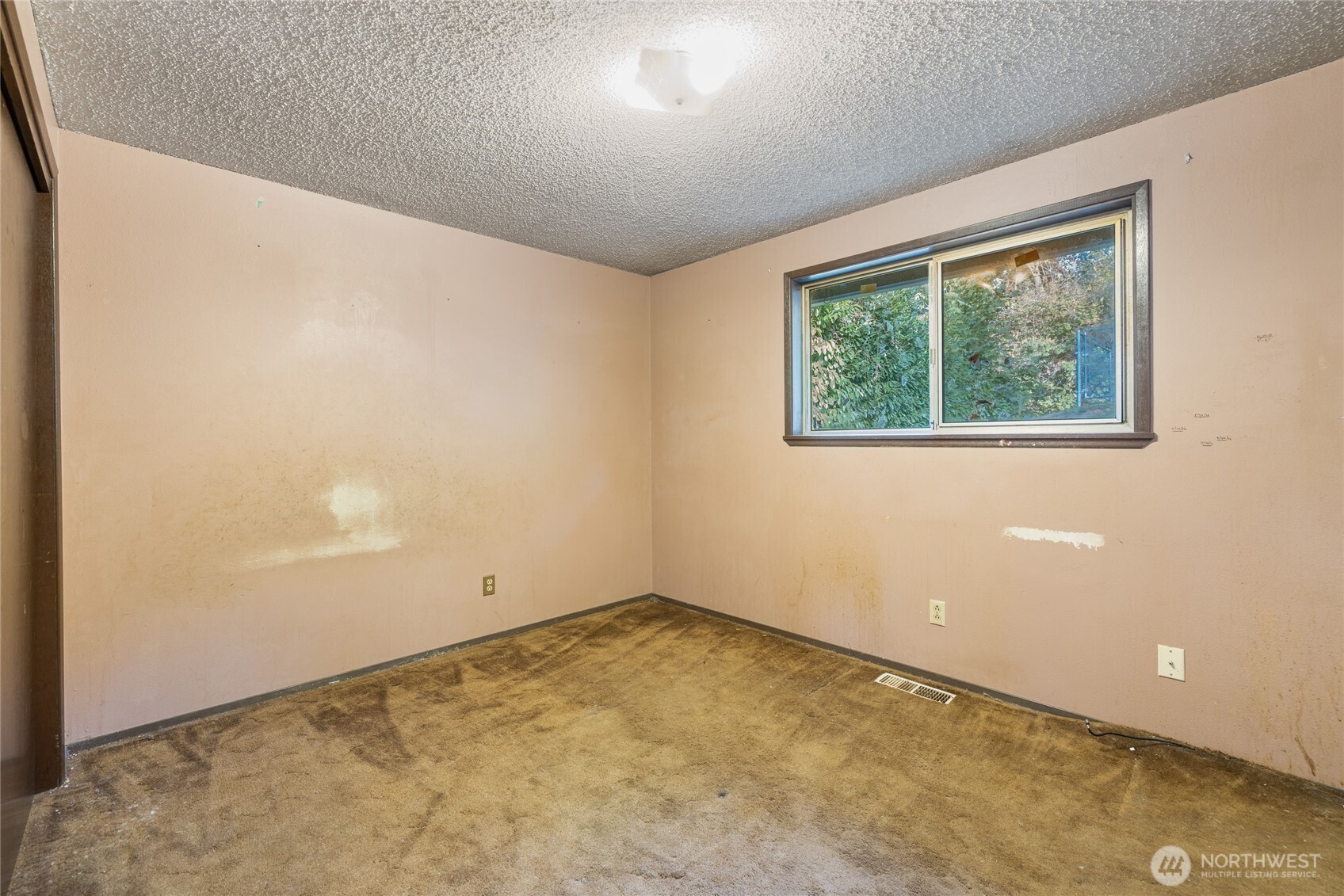 20822 Southeast 271st Street Covington, WA 98042 - Photo 5 of 30 an empty room with a window