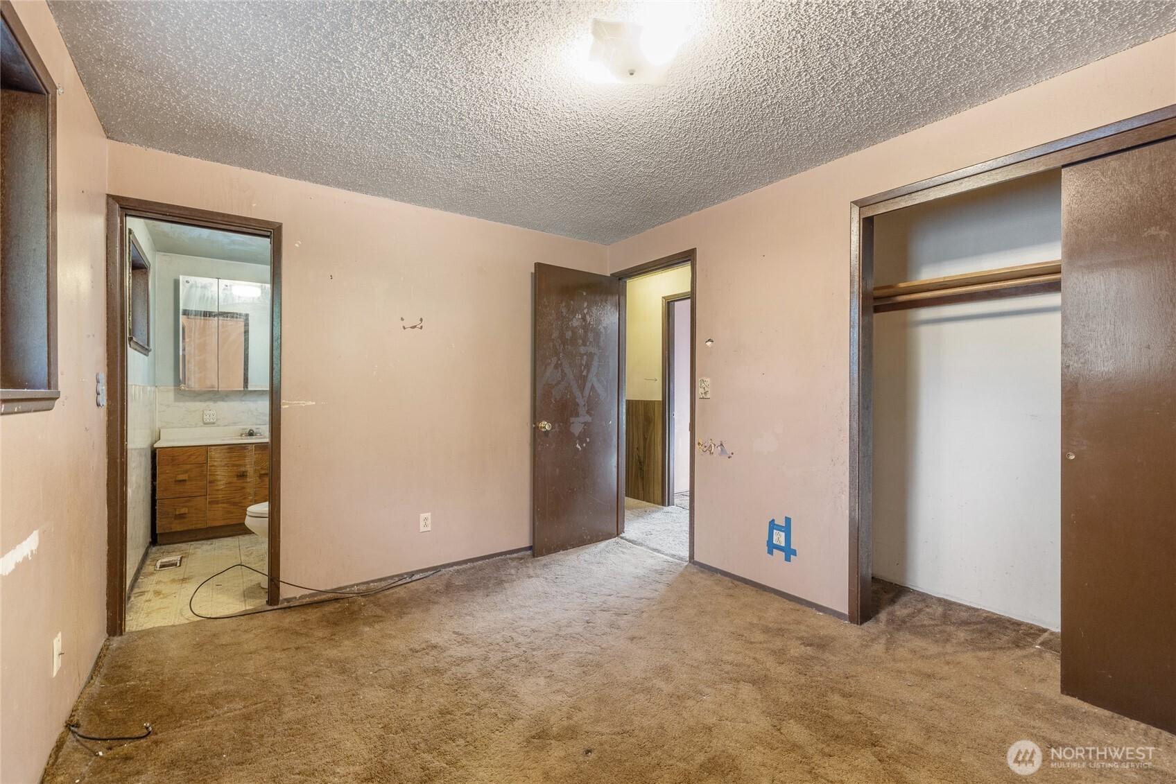 20822 Southeast 271st Street Covington, WA 98042 - Photo 6 of 30 an empty room with closet and a bathroom