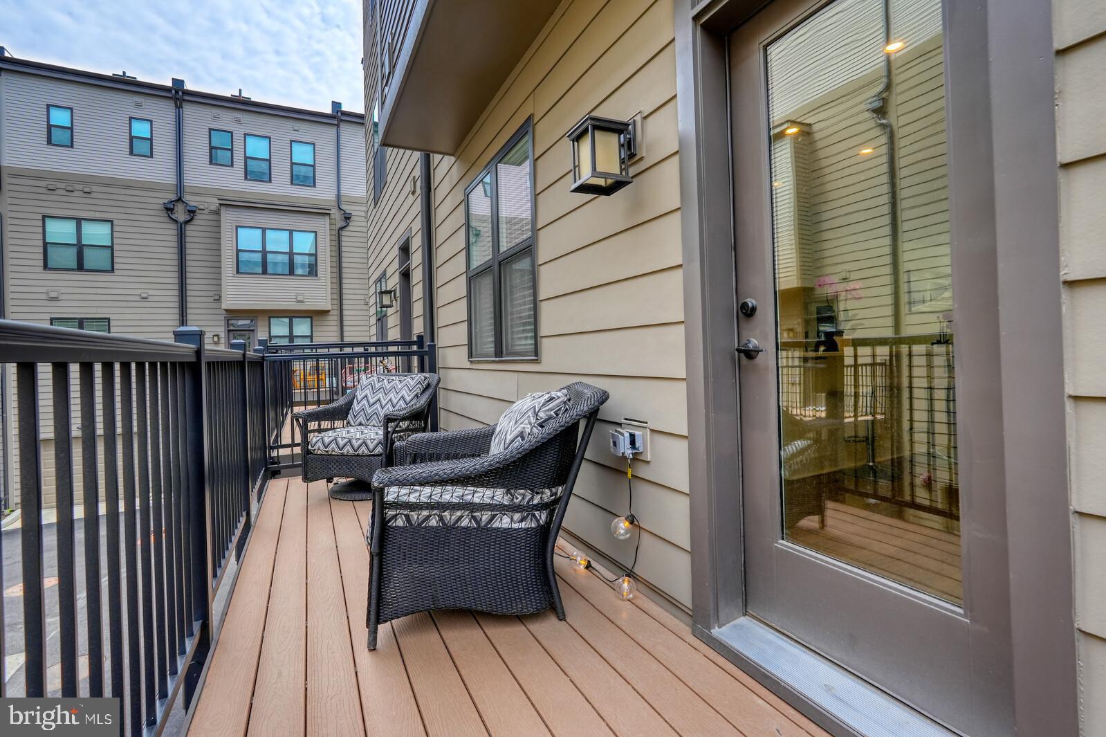 5345 Zenith Overlook Bethesda, MD 20816 - Photo 25 of 53 a balcony view with a seating space