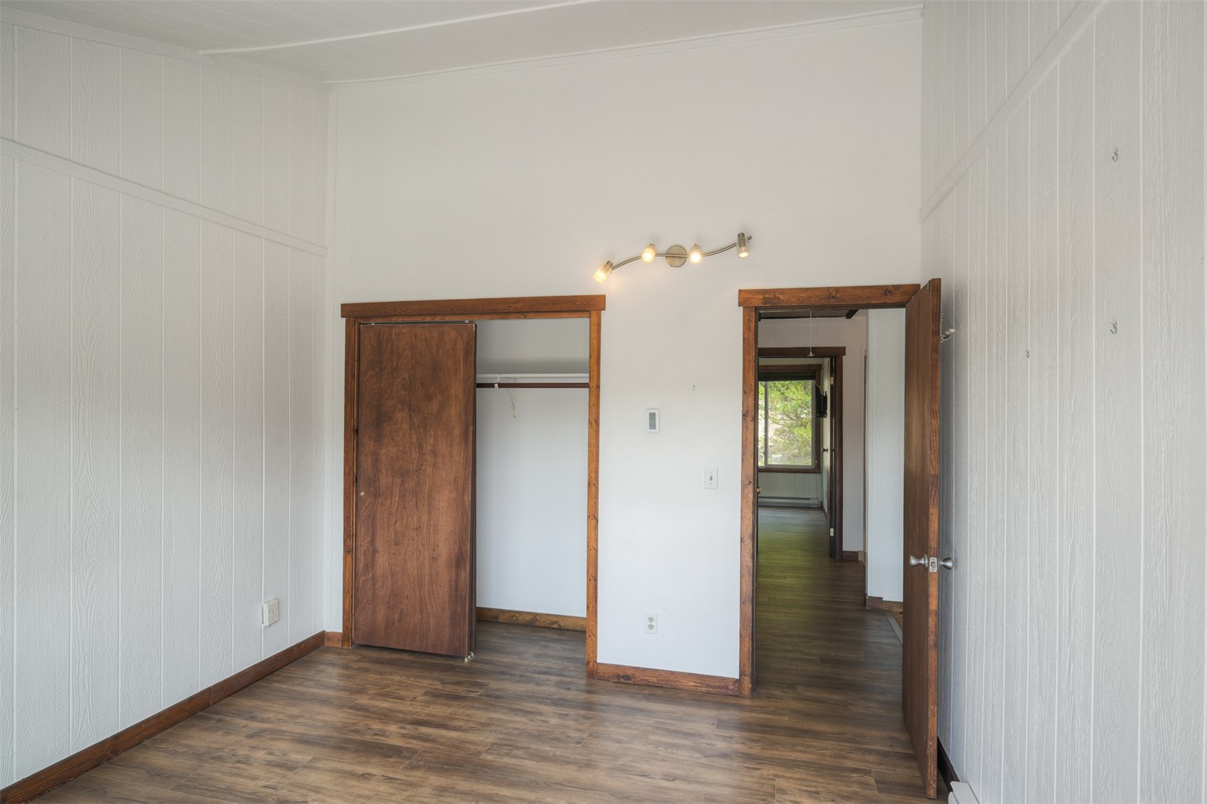 132 Illinois Gulch Road, Unit 3 Breckenridge, CO 80424 - Photo 15 of 32 an empty room with wooden floor and closet