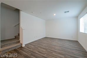 12347 Indigo Montage Road, Unit 3 Las Vegas, NV 89183 - Photo 23 of 23 An inviting family room awaits with rich wood flooring and a flowing open floor plan.