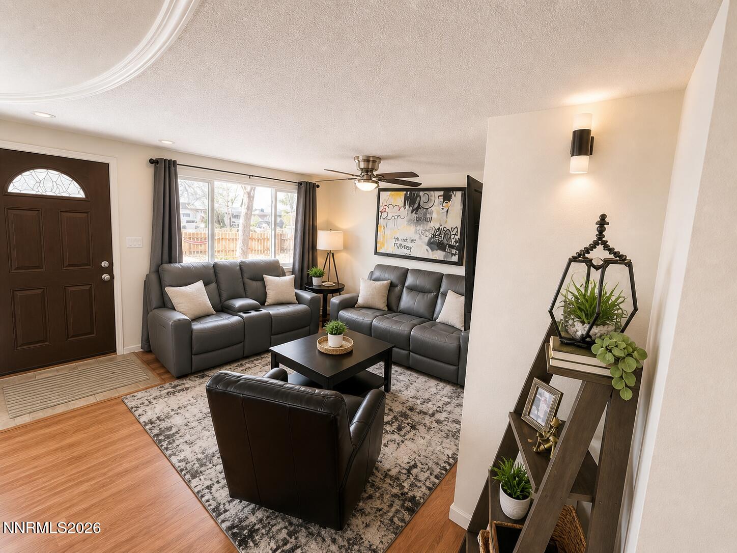 9350 Gremlin Way Reno, NV 89506 - Photo 2 of 7 a living room with furniture and wooden floor
