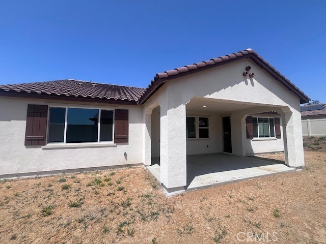 29458 Talking Stick Circle Menifee, CA 92584 - Photo 16 of 27 a front view of a house with a yard