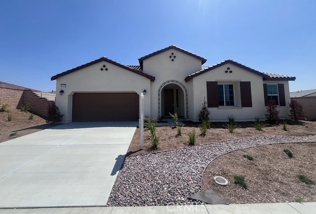 29458 Talking Stick Circle Menifee, CA 92584 - Photo 2 of 27 a front view of a house with plants