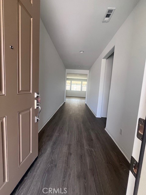 29458 Talking Stick Circle Menifee, CA 92584 - Photo 3 of 27 wooden floor in an empty room with a window