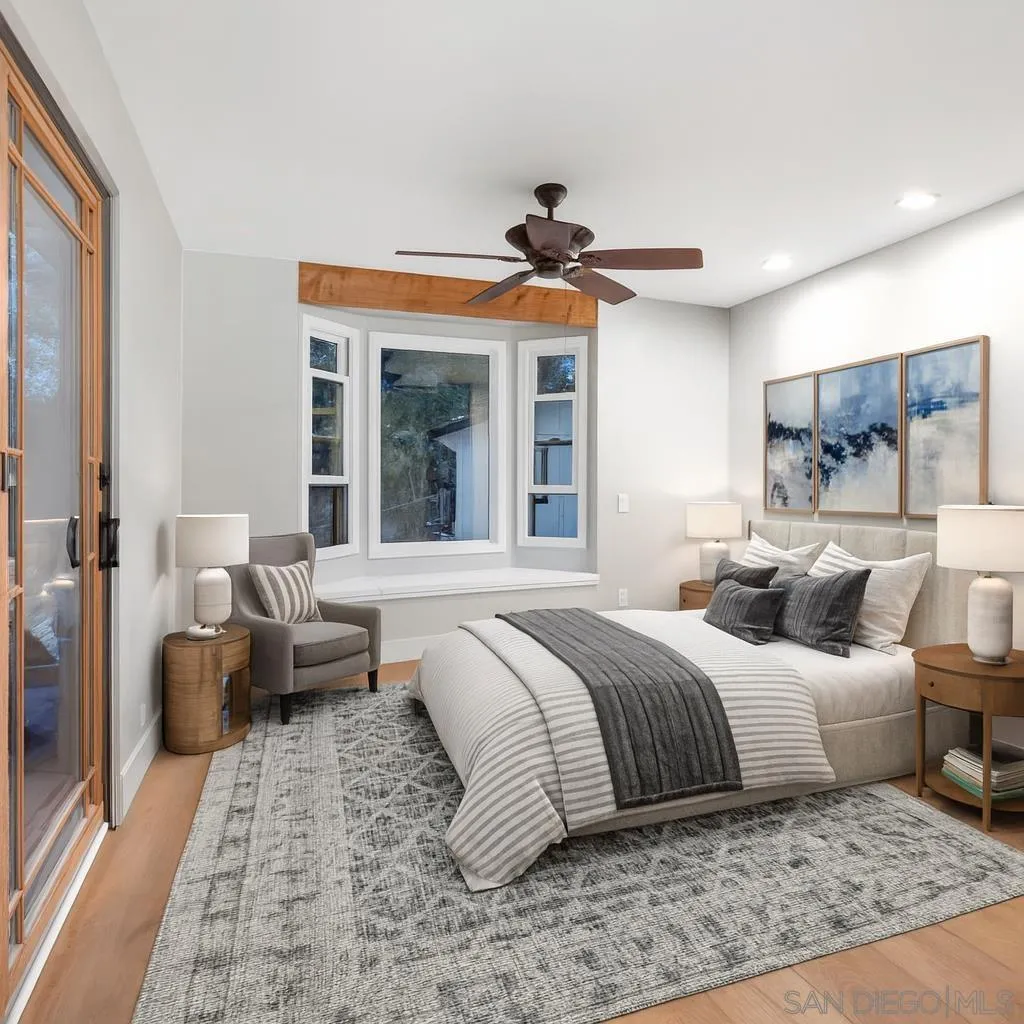 1590 Dorothea Avenue Fallbrook, CA 92028 - Photo 22 of 42 a bedroom with a large bed and a couch