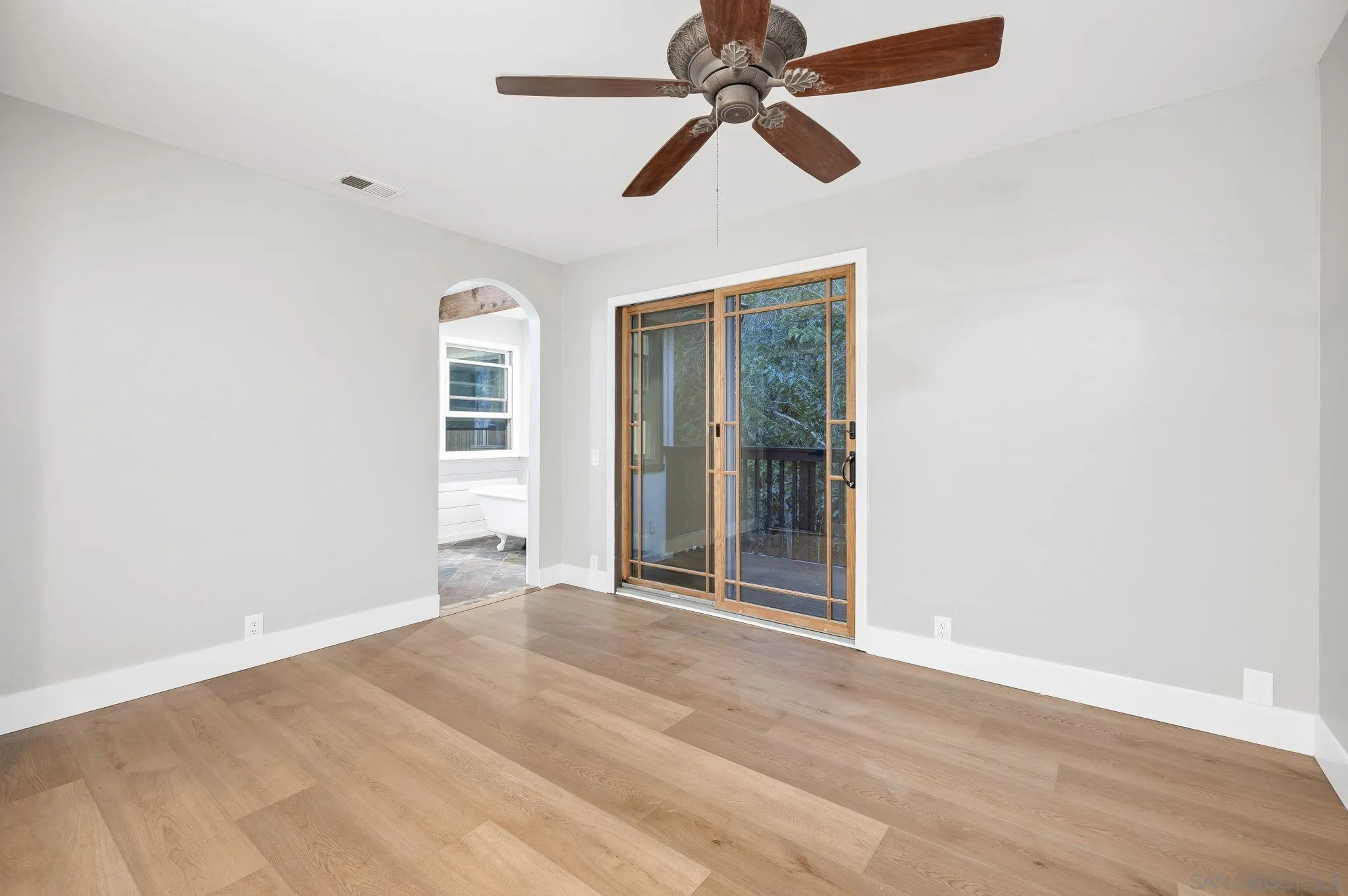 1590 Dorothea Avenue Fallbrook, CA 92028 - Photo 24 of 42 an empty room with windows and fan