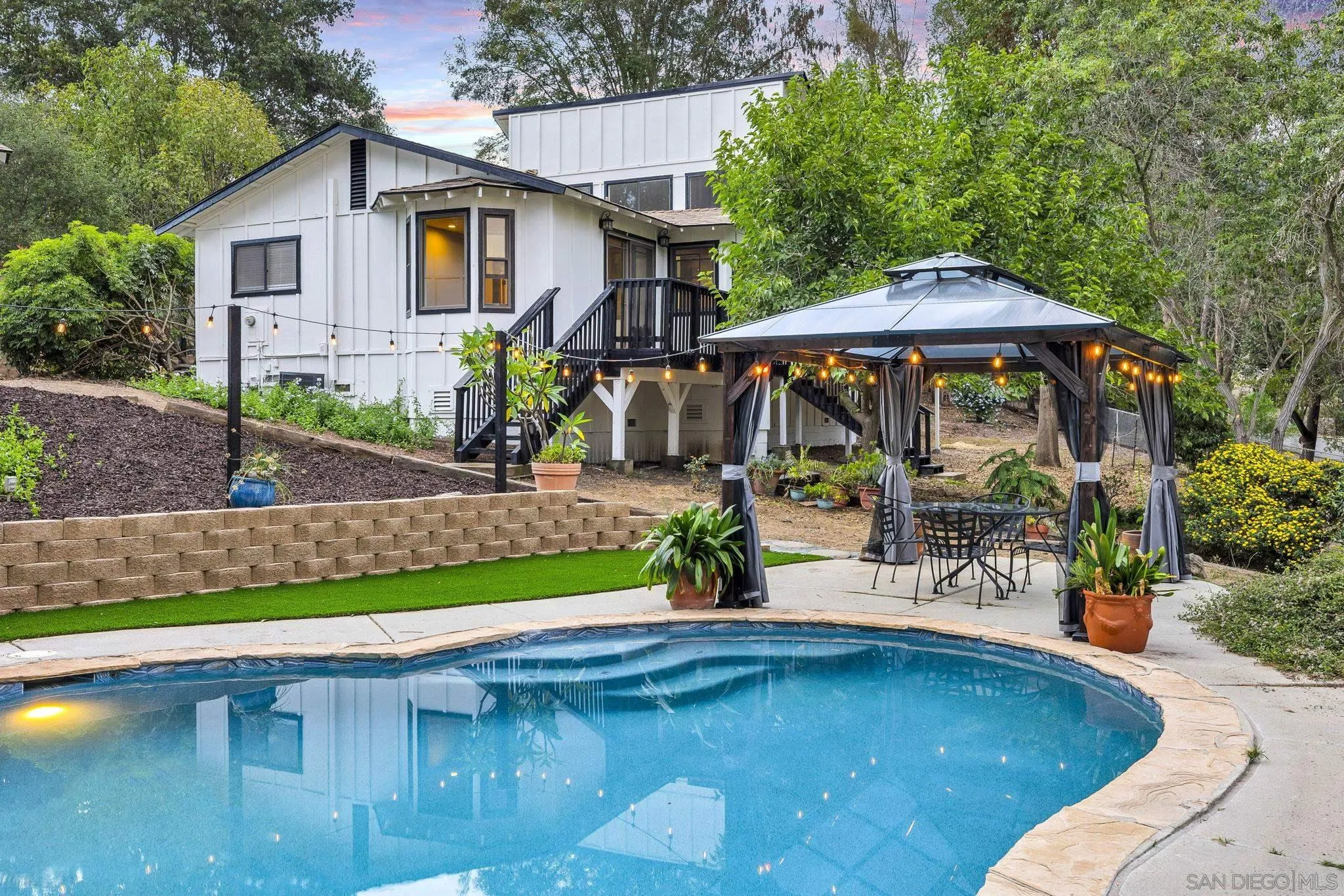 1590 Dorothea Avenue Fallbrook, CA 92028 - Photo 29 of 42 a view of a house with pool yard and sitting area