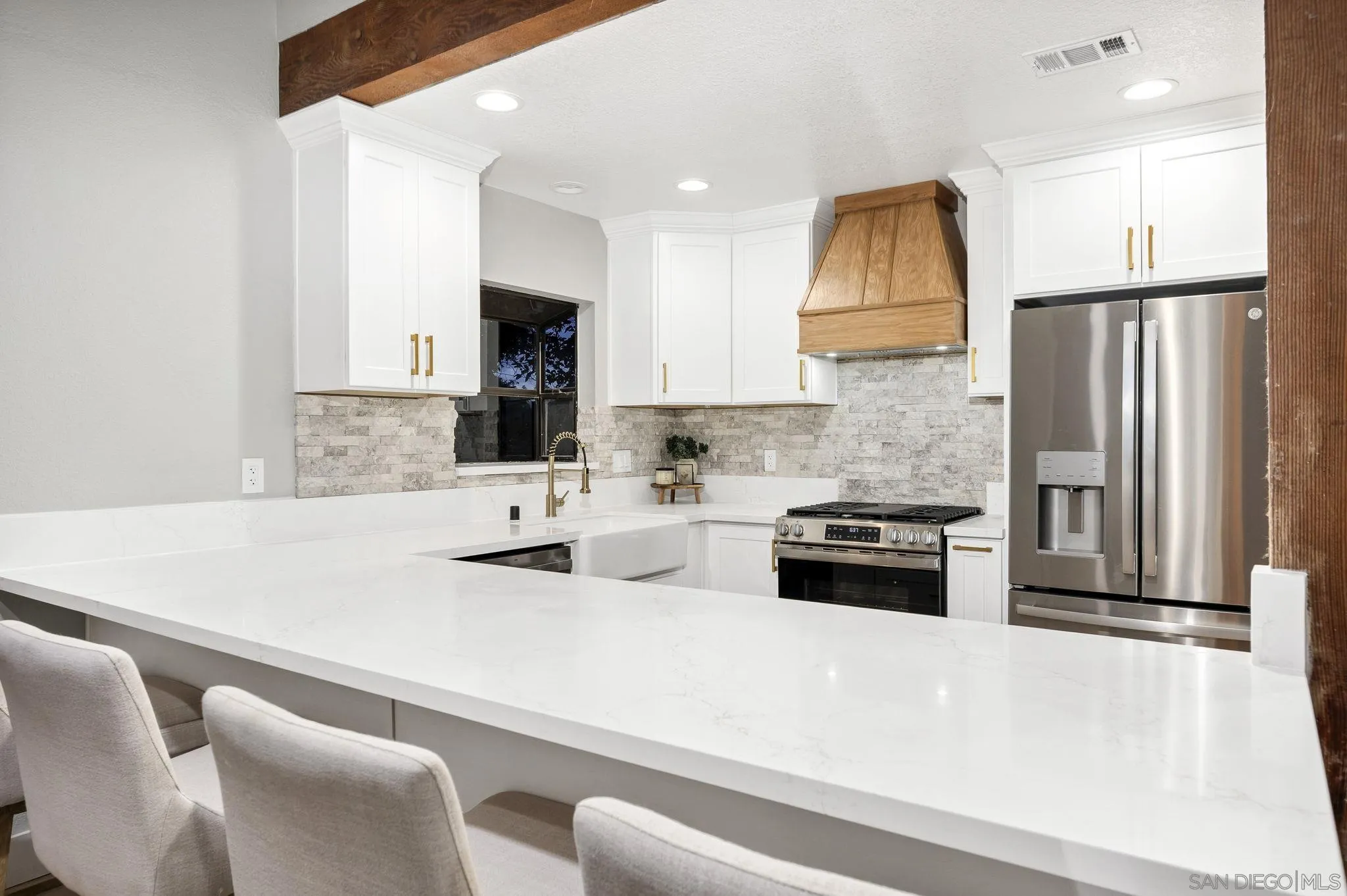 1590 Dorothea Avenue Fallbrook, CA 92028 - Photo 9 of 42 a kitchen with stainless steel appliances a stove a sink a refrigerator and cabinets