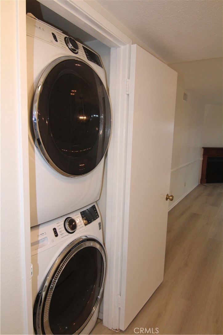 955 East 3rd Street, Unit 204 Long Beach, CA 90802 - Photo 12 of 37 a utility room with dryer and washer