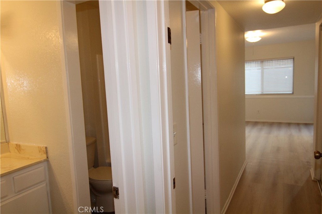 955 East 3rd Street, Unit 204 Long Beach, CA 90802 - Photo 17 of 37 a view of a hallway with wooden floor