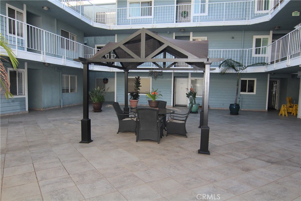 955 East 3rd Street, Unit 204 Long Beach, CA 90802 - Photo 24 of 37 a view of a car park in front of building