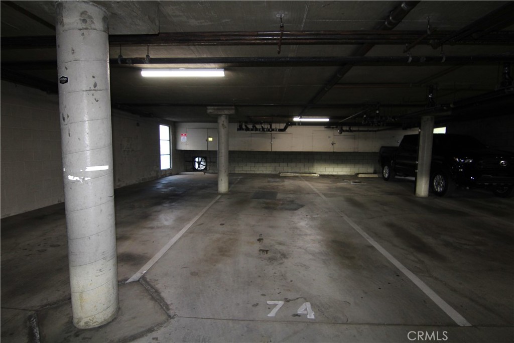 955 East 3rd Street, Unit 204 Long Beach, CA 90802 - Photo 36 of 37 a view of a room with wooden floor
