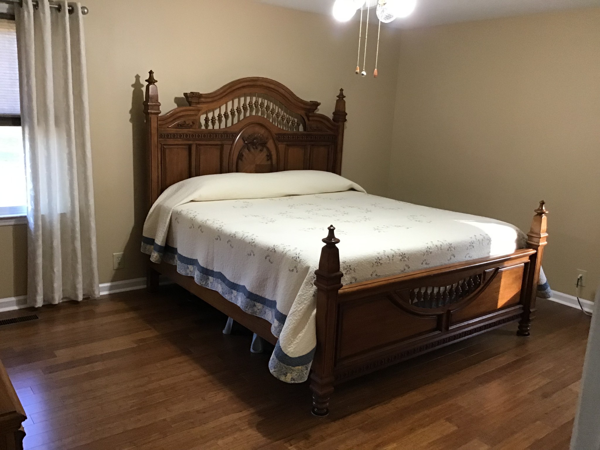 344 Freedom Drive Murfreesboro, TN 37127 - Photo 11 of 18 a bedroom with a bed and wooden floor