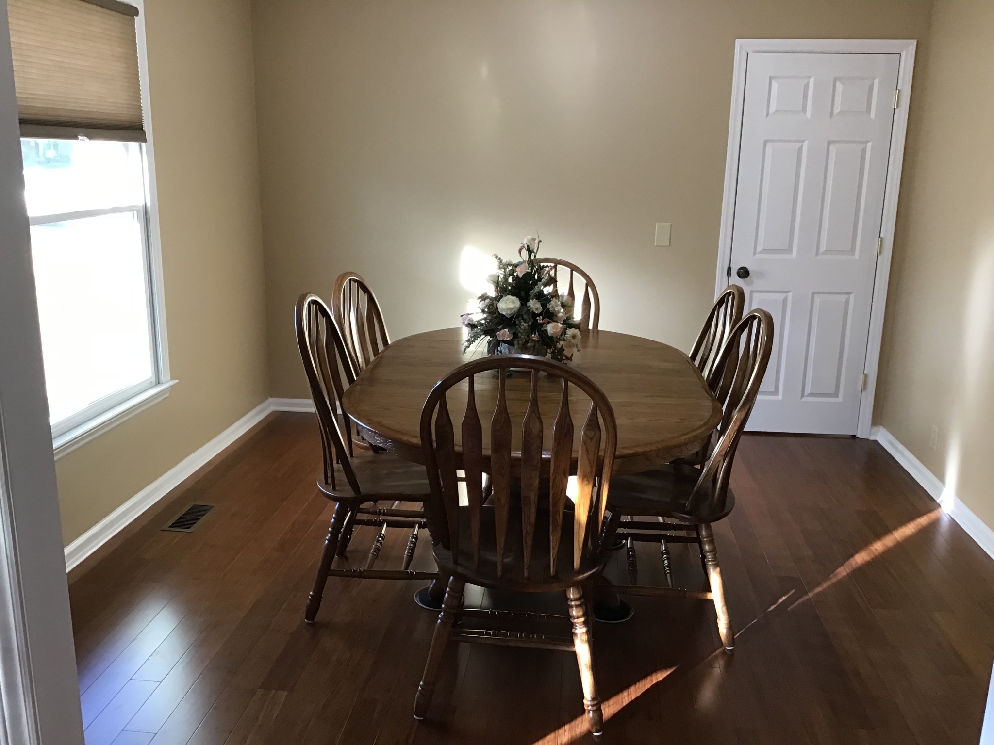 344 Freedom Drive Murfreesboro, TN 37127 - Photo 3 of 18 a view of a dining room with furniture and wooden floor