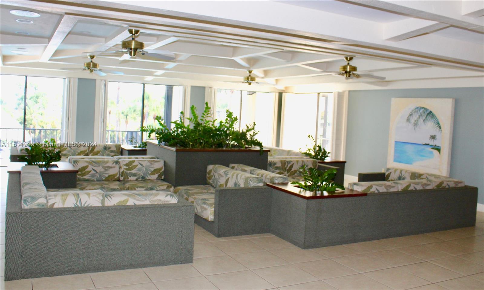 10433 Southwest 80th Street Miami, FL 33173 - Photo 19 of 24 a living room with furniture and a potted plant