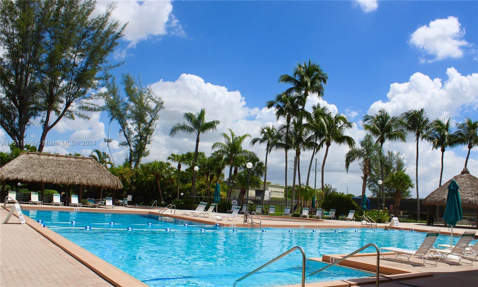 10433 Southwest 80th Street Miami, FL 33173 - Photo 20 of 24 a view of a swimming pool with a patio
