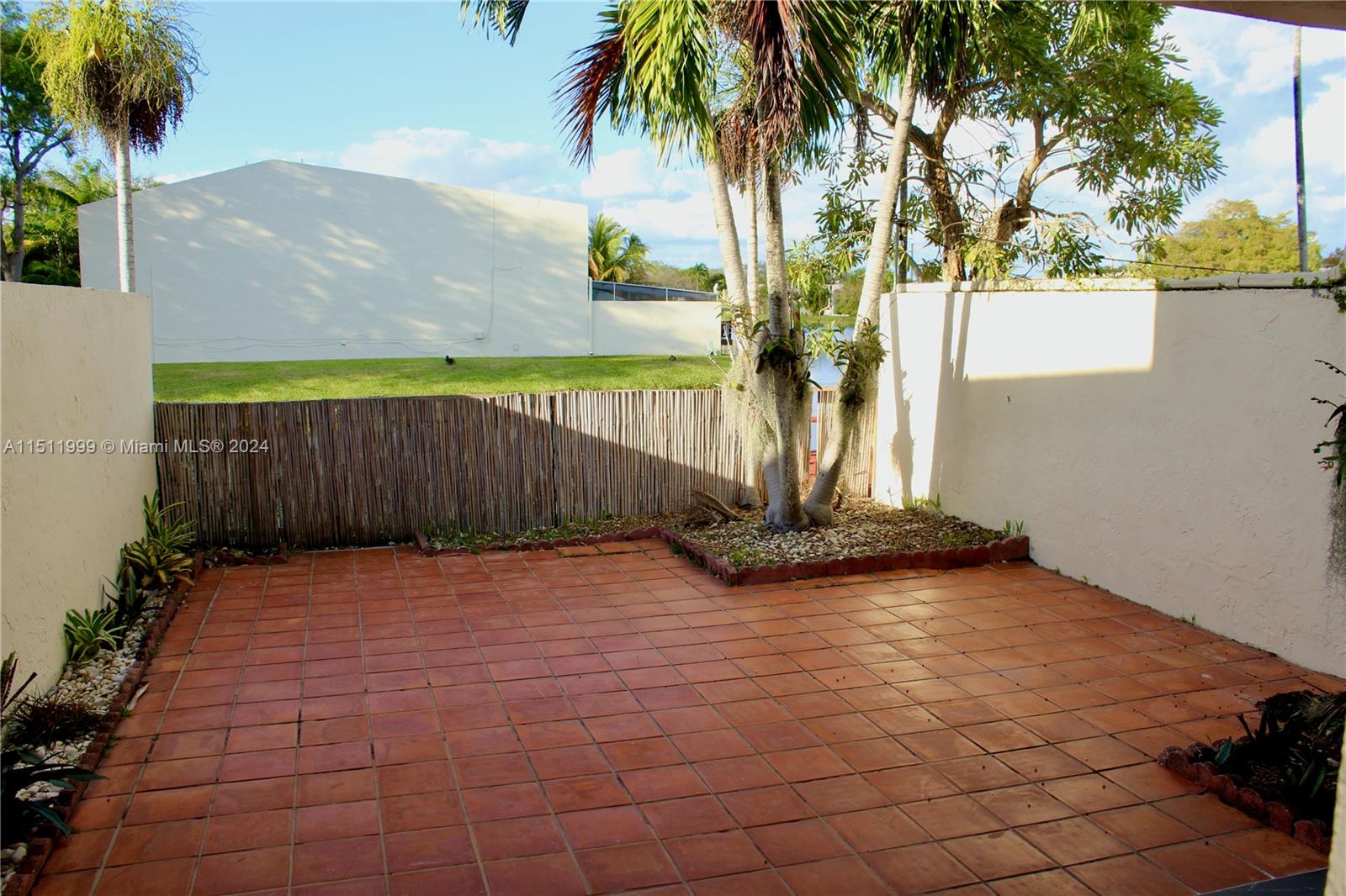 10433 Southwest 80th Street Miami, FL 33173 - Photo 9 of 24 a view of a backyard