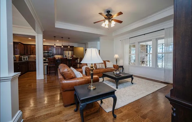 a kitchen with granite countertop stainless steel appliances and wooden cabinets