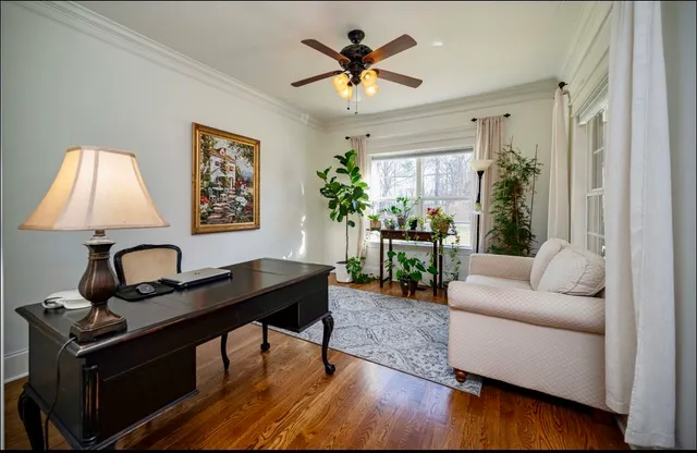 a bathroom with a sink a toilet a mirror and bathtub