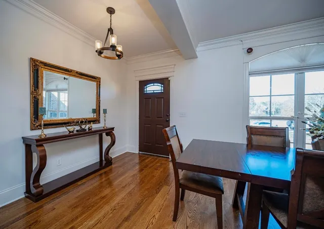 a kitchen with a sink stove top oven and cabinets
