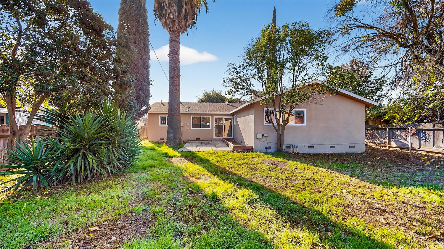 1611 East Olive Avenue Merced, CA 95340 - Photo 31 of 43 a house view with a garden space