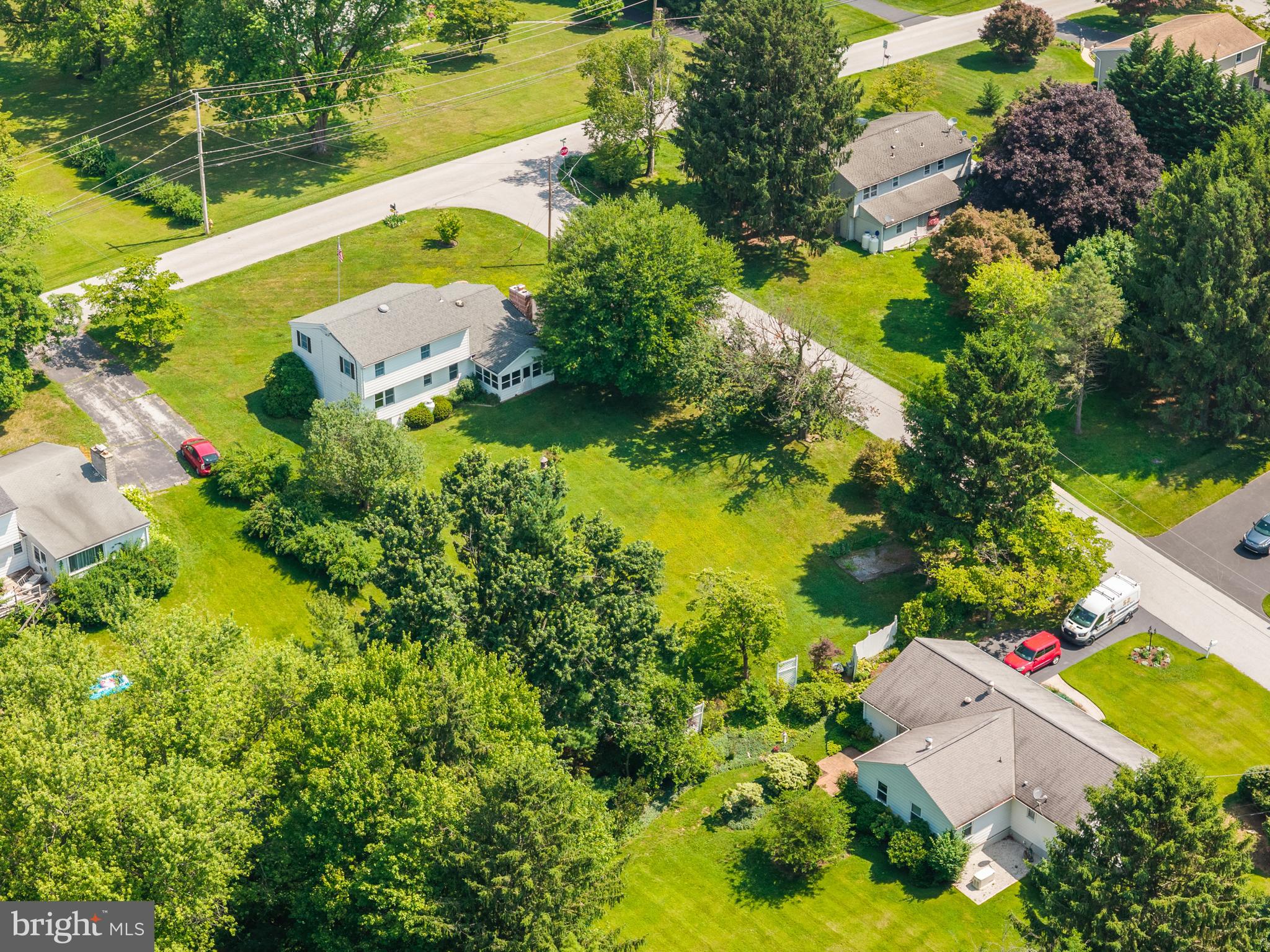258 Monacy Road Coatesville, PA 19320 - Photo 50 of 54 an aerial view of a house with a garden and lake view