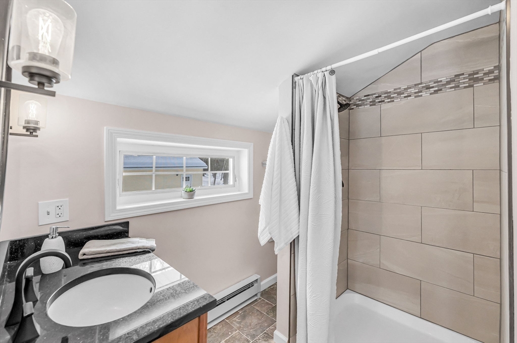 338 Daniel Shays Highway Pelham, MA 01002 - Photo 33 of 41 a bathroom with a sink toilet and shower