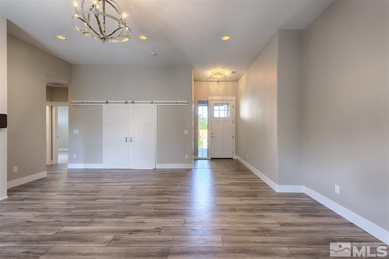1364 Charles Drive Reno, NV 89509 - Photo 6 of 18 a view of empty room with wooden floor