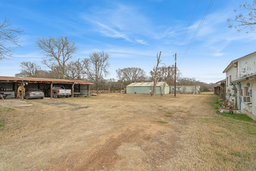1571 VZ County Road Ben Wheeler, TX 75754 - Photo 36 of 39 a view of a house with a yard