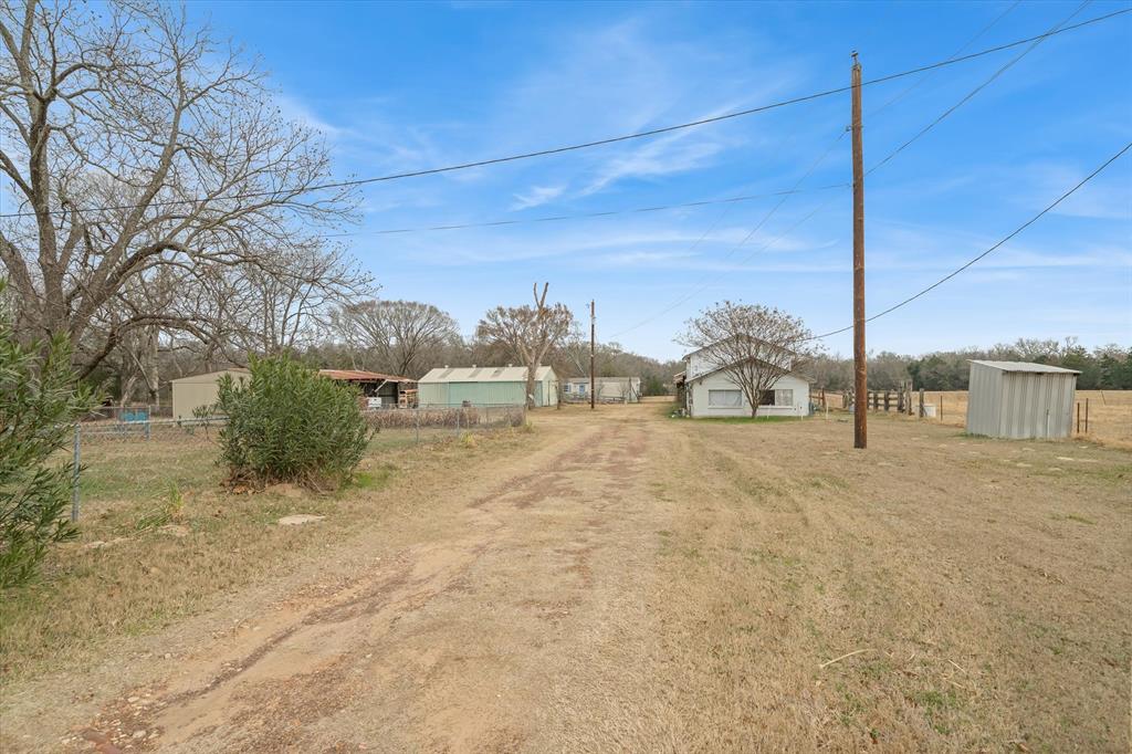 1571 VZ County Road Ben Wheeler, TX 75754 - Photo 4 of 39 a view of a road with a building in the background