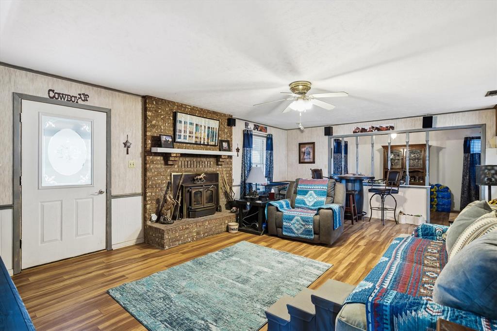 1571 VZ County Road Ben Wheeler, TX 75754 - Photo 7 of 39 a living room with furniture and a fireplace