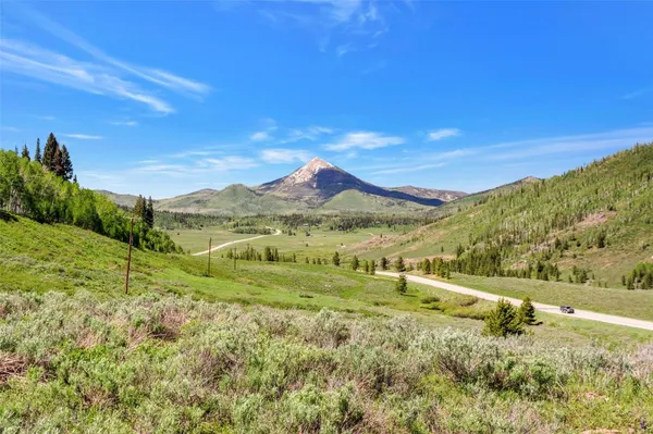 a view of an outdoor space with mountain view
