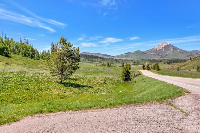 a view of a lake with a mountain in the background