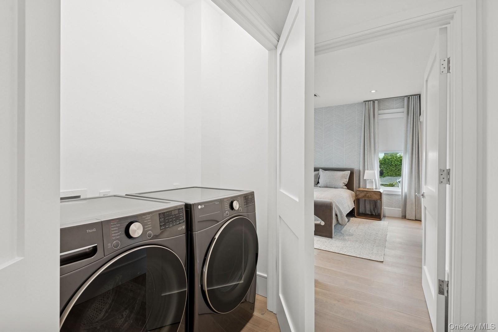 8 Magnolia Drive, Unit 2A Water Mill, NY 11976 - Photo 17 of 39 a view of storage and utility room with washer and dryer