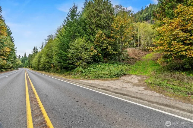 a view of a balcony with trees