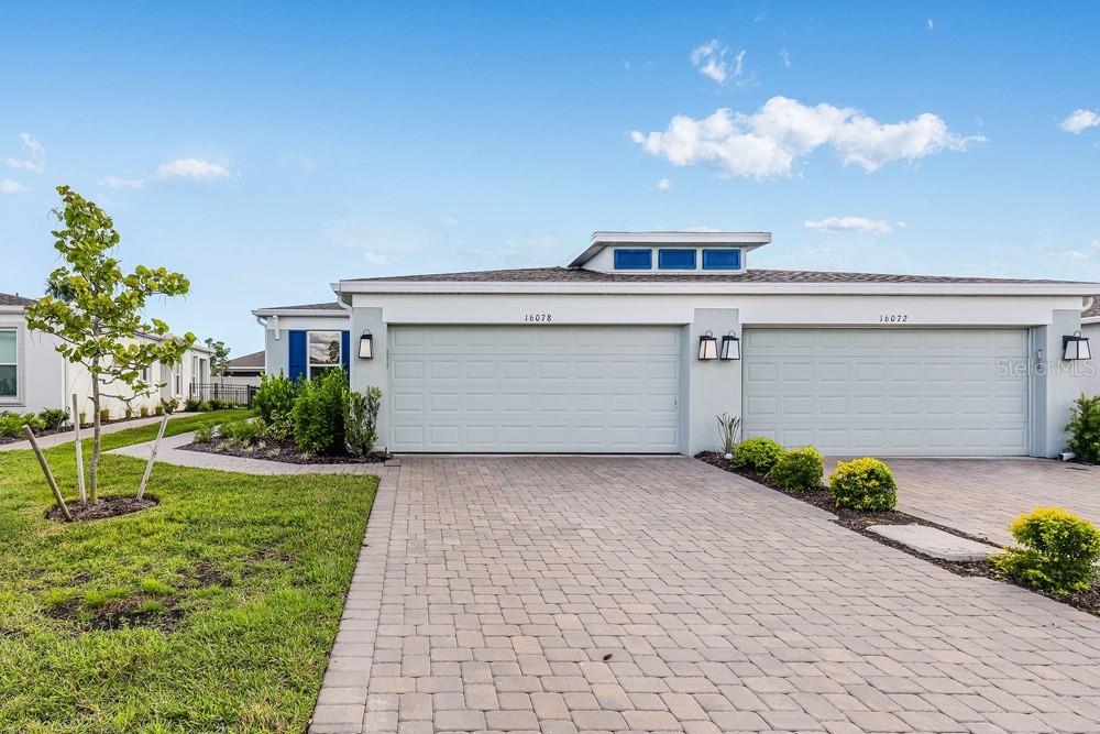 16078 Ivy Ridge Port Charlotte, FL 33953 - Photo 1 of 1 a front view of house with yard
