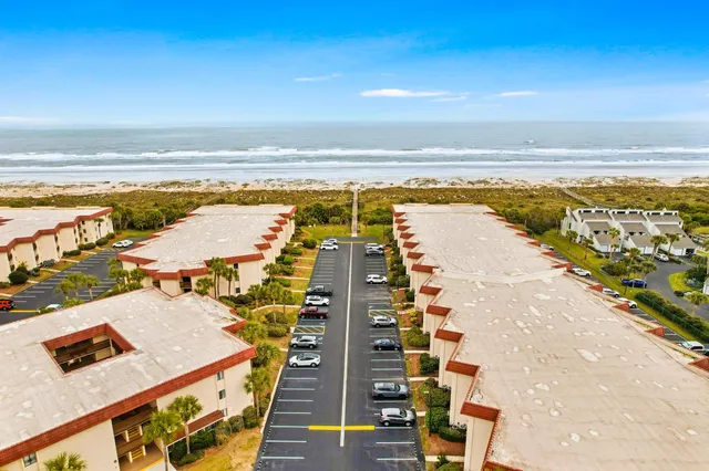 a view of a city with an ocean view