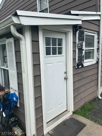 a view of front door and porch