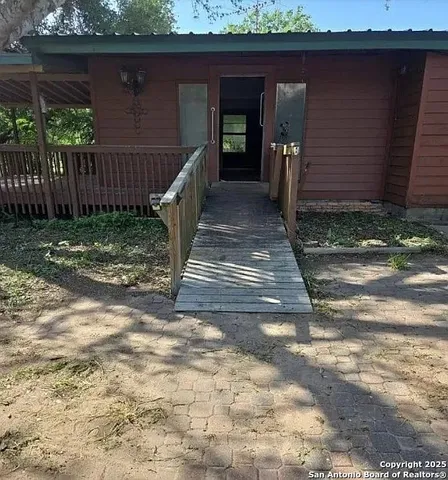 a view of a house with a street