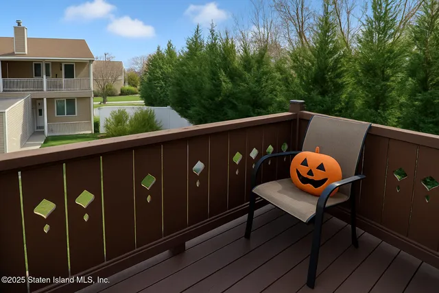 a bathroom with a granite countertop sink mirror vanity and toilet
