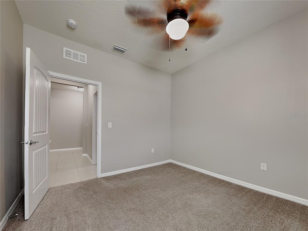 Undisclosed Address Spring Hill, FL 34609 - Photo 14 of 17 a view of an empty room
