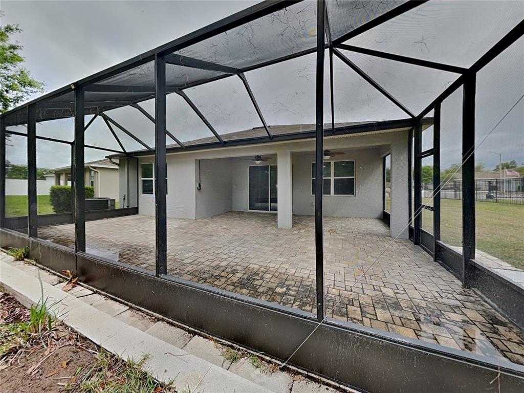 Undisclosed Address Spring Hill, FL 34609 - Photo 17 of 17 a view of a house with a porch