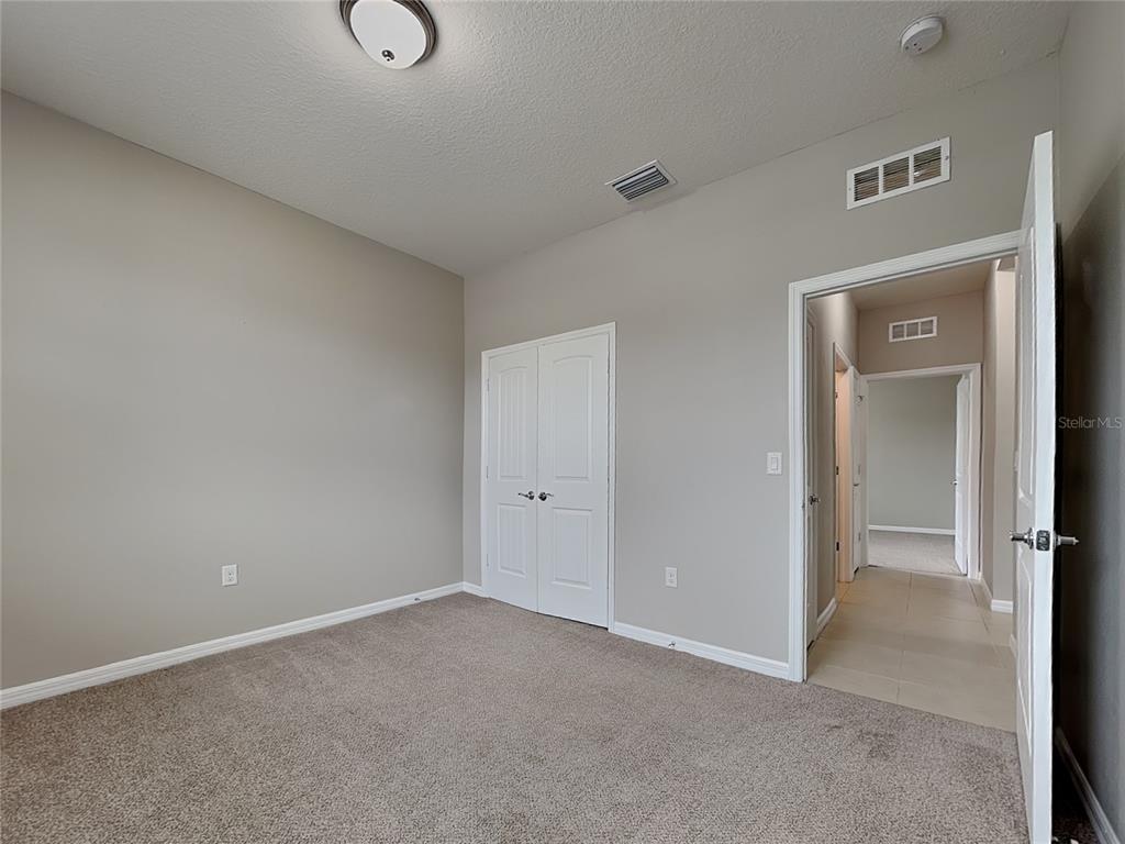 Undisclosed Address Spring Hill, FL 34609 - Photo 10 of 17 a view of an empty room