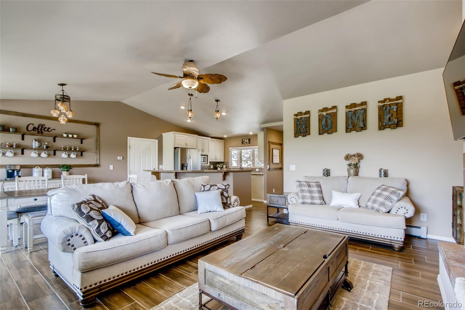 18030 Ranch Hand Road Peyton, CO 80831 - Photo 8 of 40 a living room with furniture