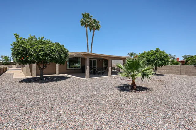 a view of a golf course with a lake