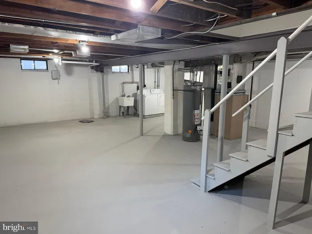 a view of an empty room with stairs