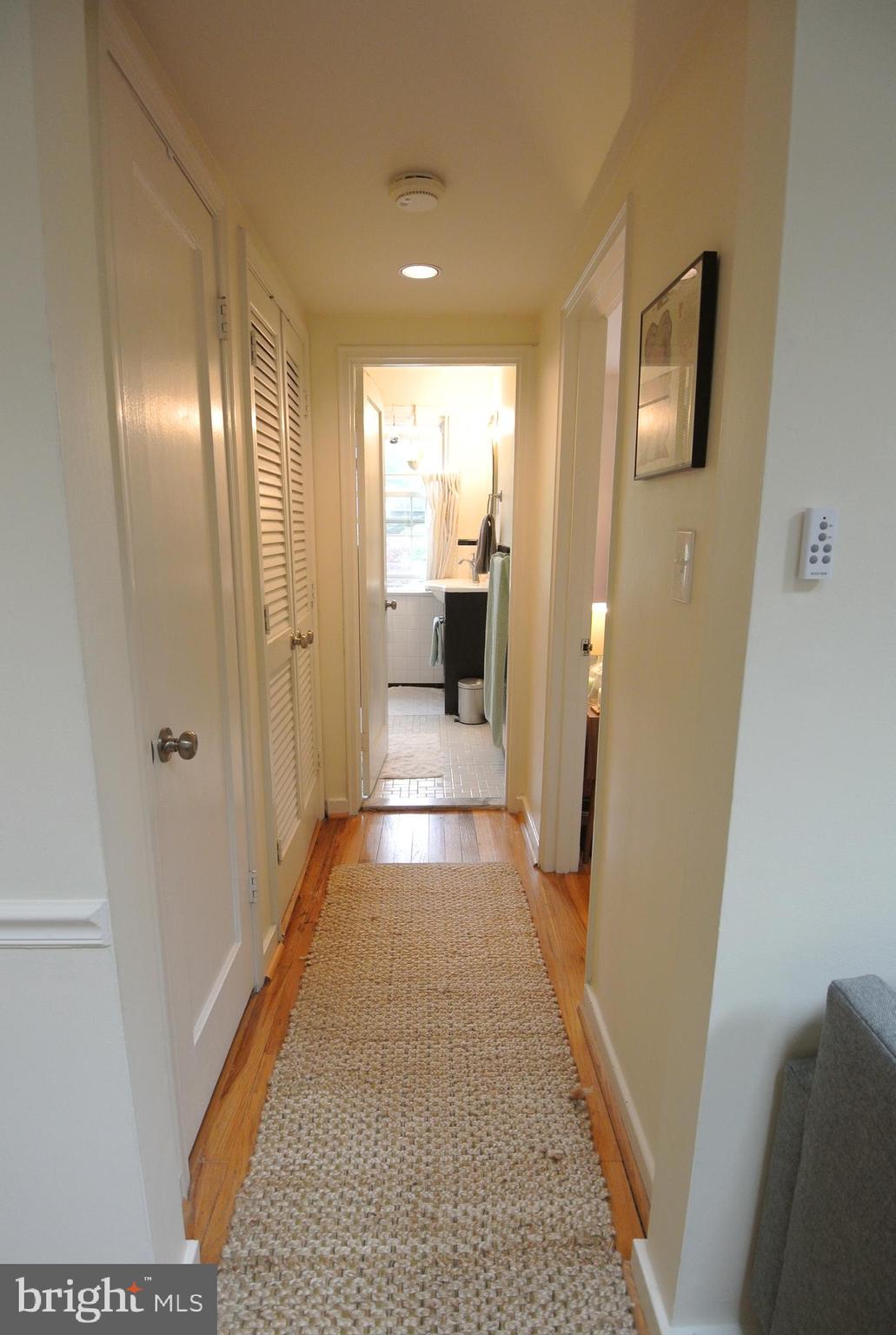 8205 Grubb Road, Unit G202 Silver Spring, MD 20910 - Photo 18 of 38 HALL LEADING TO BATH & BEDROOM. LAUNDRY TOO.