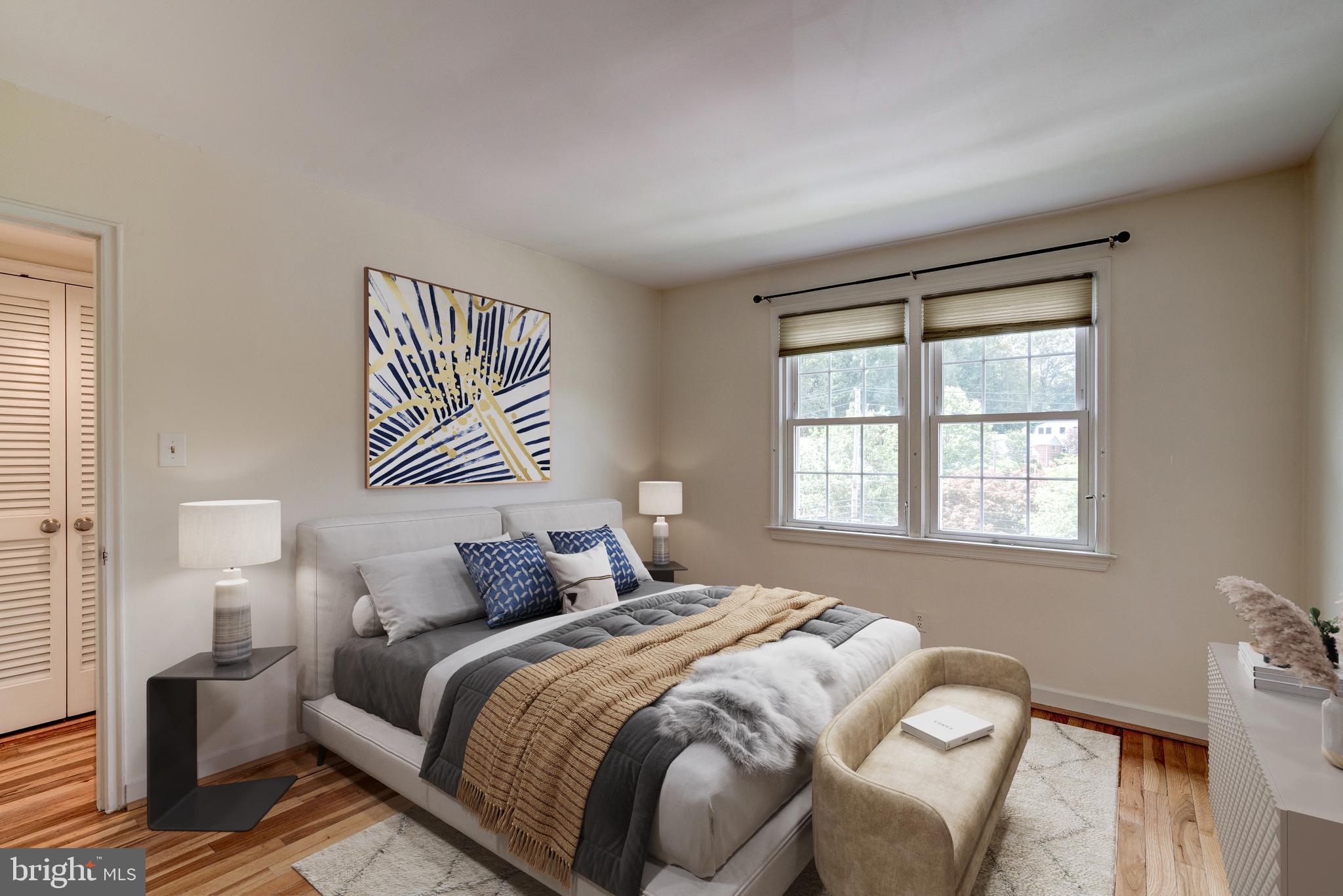 8205 Grubb Road, Unit G202 Silver Spring, MD 20910 - Photo 21 of 38 MAIN LEVEL BEDROOM W/SUNNY EXPOSURE.