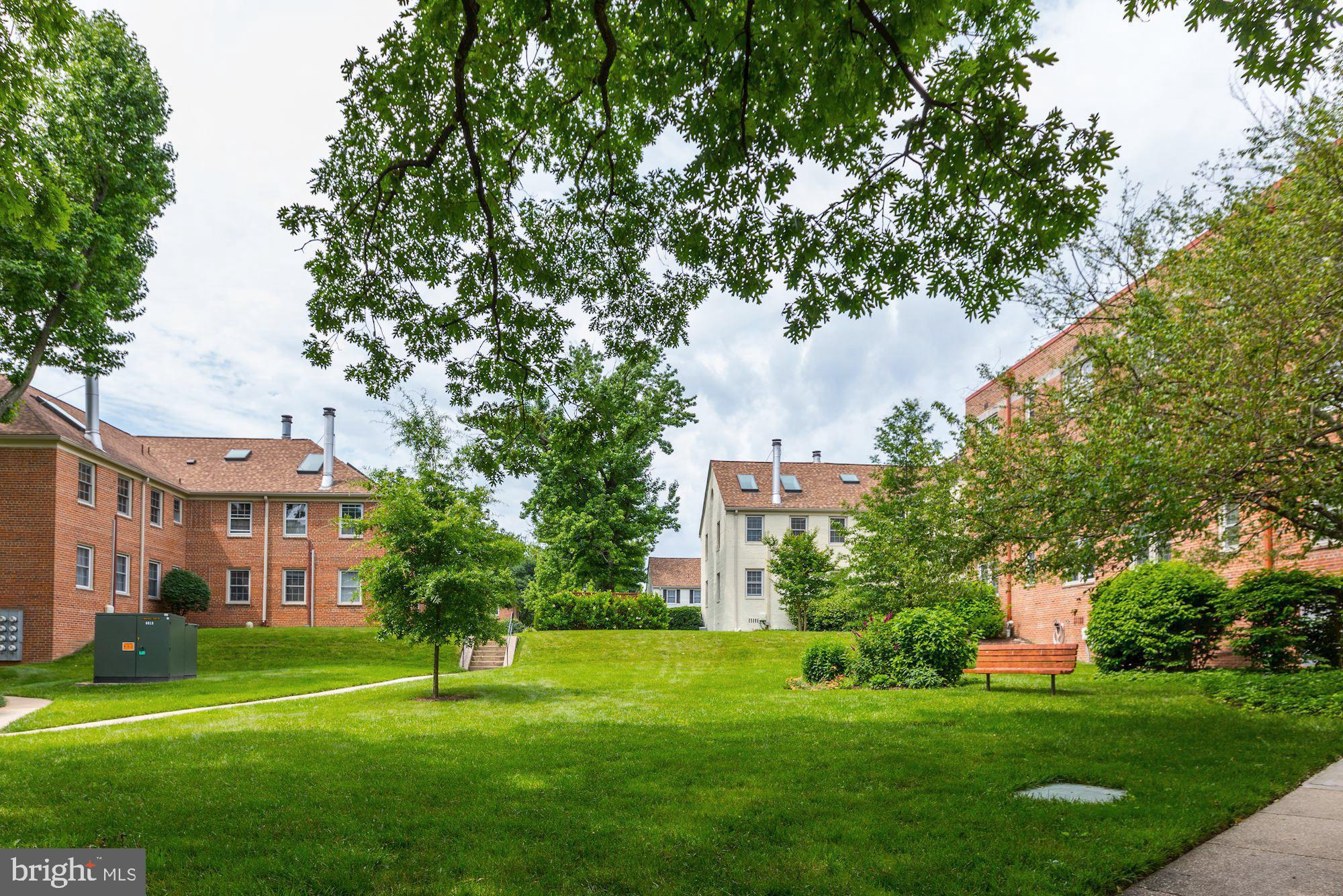 8205 Grubb Road, Unit G202 Silver Spring, MD 20910 - Photo 28 of 38 ANOTHER GREEN COURT WITH BUTTERFLY GARDEN.
